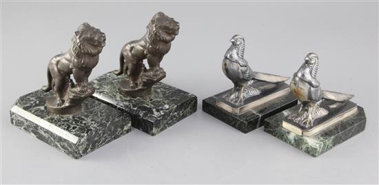 Maurice Frécourt. Two pairs of Art Deco bronzed and silvered metal bookends, roaring lions and Asian pheasants, 5.75in. and 5.5in.